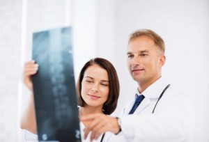 two doctors looking at x-ray